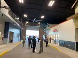 People walking through the MPD scenario village.